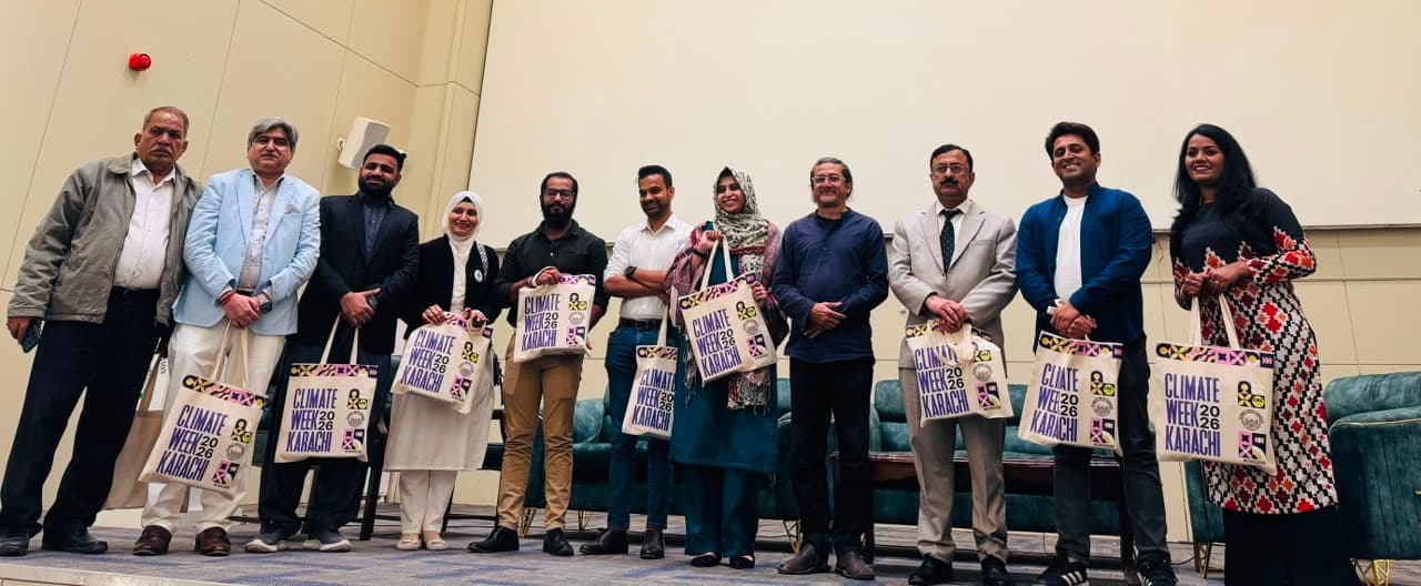 Community event participants holding their illustrated custom tote bags